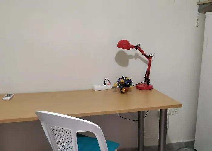 Quarto em Acomodações Particulares Vacations In *